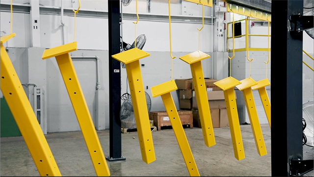 Wildeck’s two-part polyurethane paint line has been replaced with a new, state-of-the-art, powder co Wildeck’s two-part polyurethane paint line has been replaced with a new, state-of-the-art, powder co